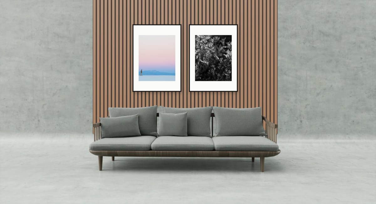 Walnut slatted wall beside a concrete surface