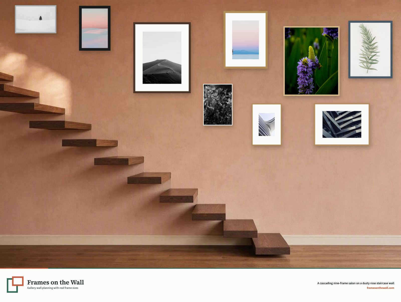 A cascading nine-frame gallery wall beside floating walnut stairs on a dusty rose wall