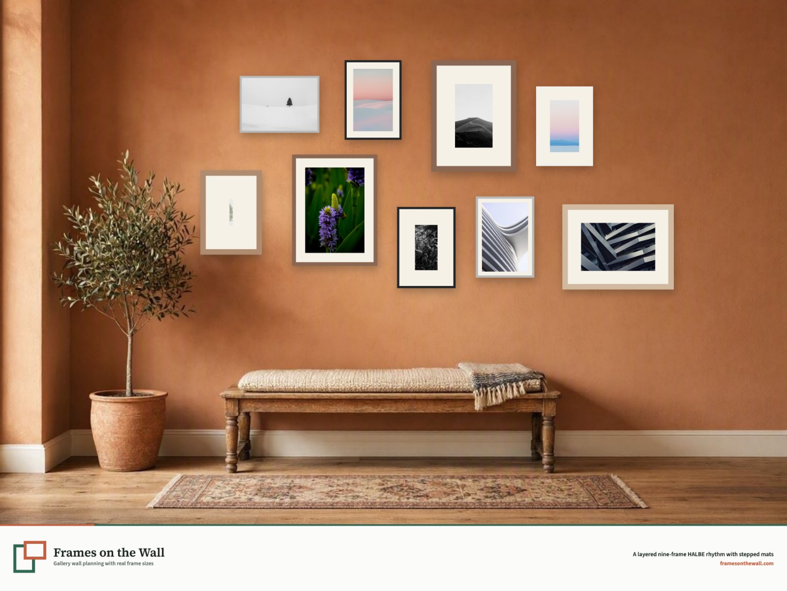 Layered gallery wall of nine HALBE wood and aluminium frames on a terracotta hallway wall above an upholstered bench