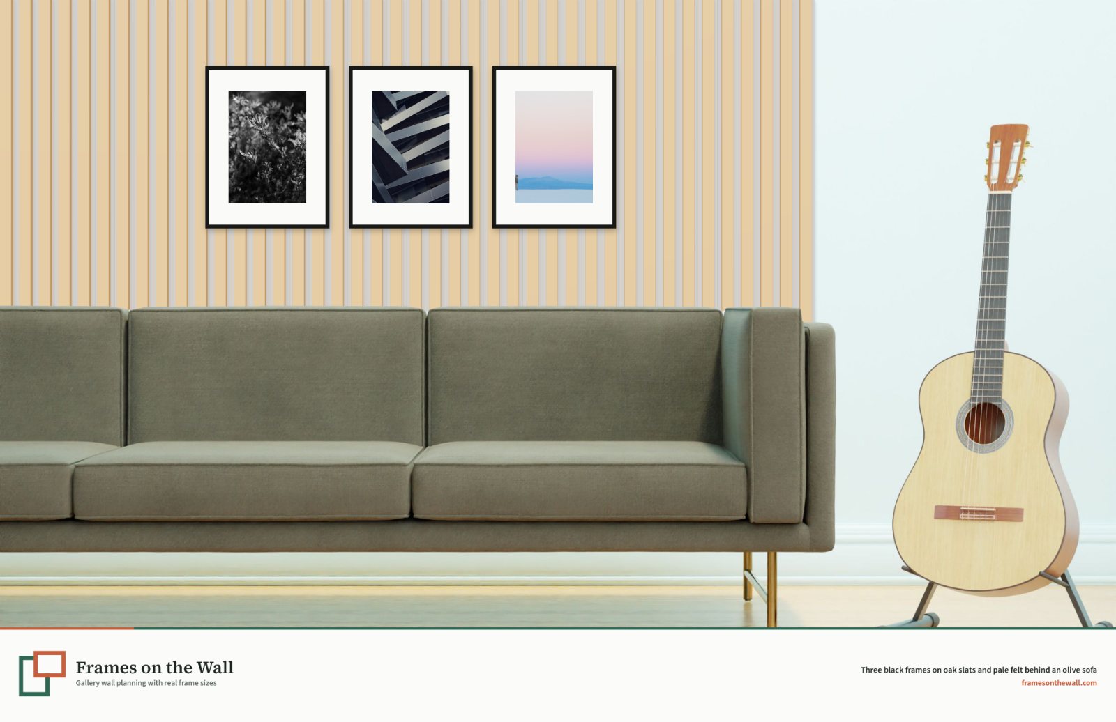 Light oak slats on pale felt from floor to baseboard behind an olive sofa, with three black frames and a guitar beside it