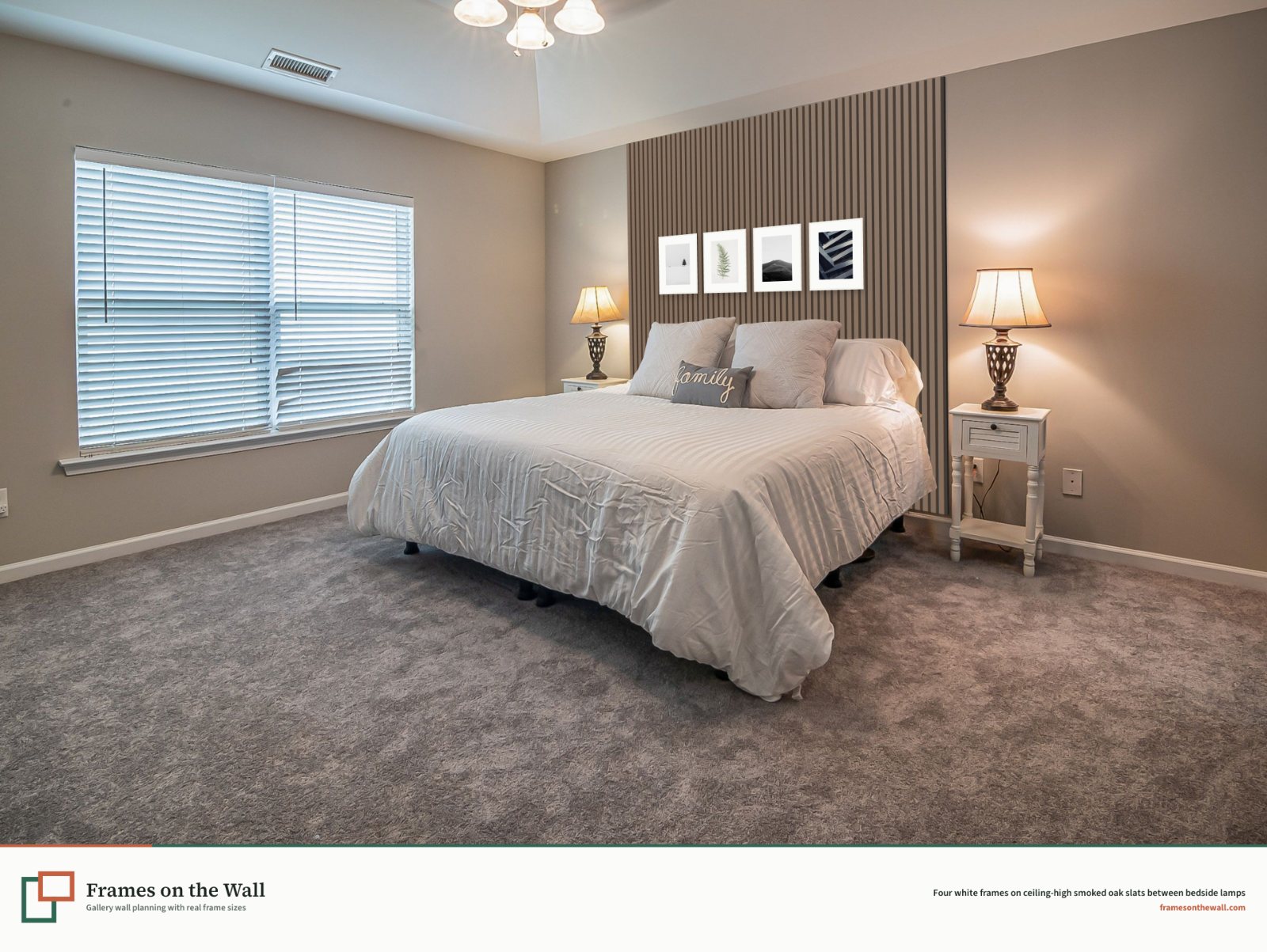 Smoked oak slats from floor to ceiling behind a bed with four white frames